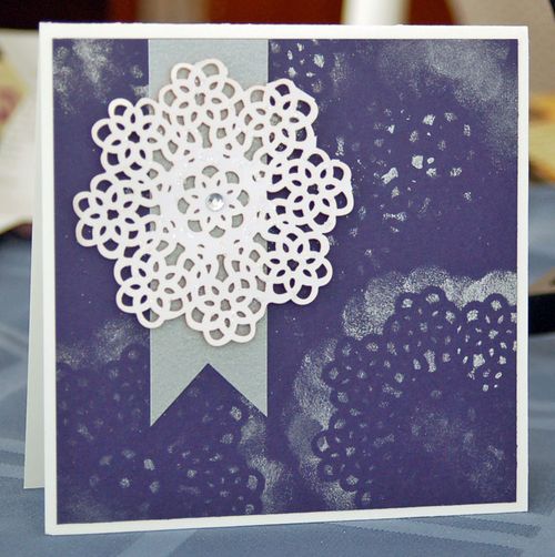 A white doily looks a lot like a snowflake, doesn't it?