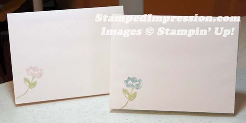 The hand stamped flowers dress up these envelopes!